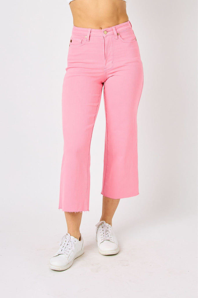Pink high-waist cropped jeans with raw hem for women, perfect for summer collection boutique and new arrivals in women's fashion.
