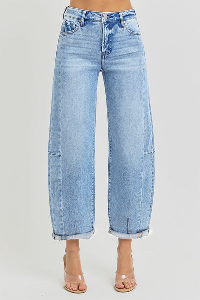High rise barrel jeans with cuffed hem in blue denim, perfect for women's boutique clothing and summer collection styles.