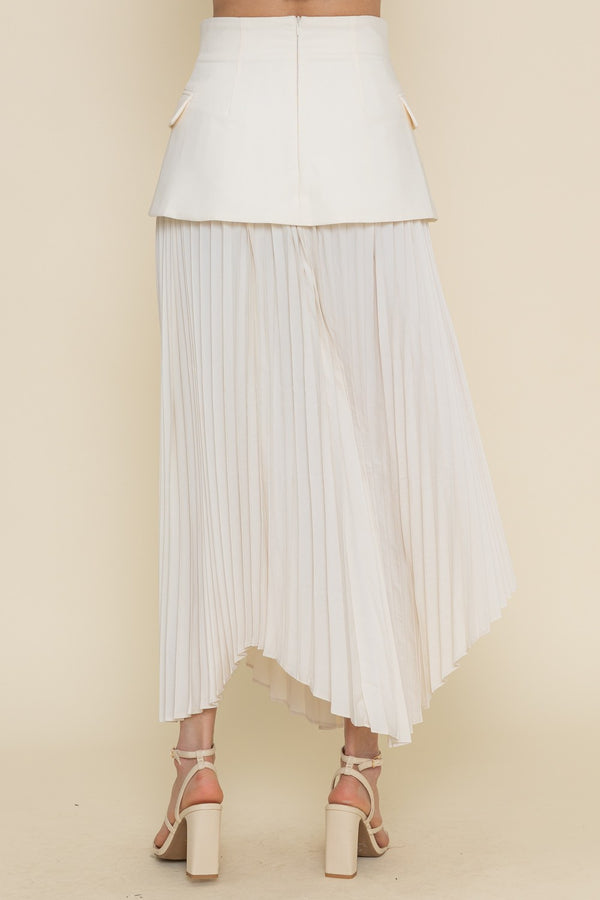 Asymmetric pleated skirt from women’s boutique clothing, perfect for summer collection and exclusive women's fashion.