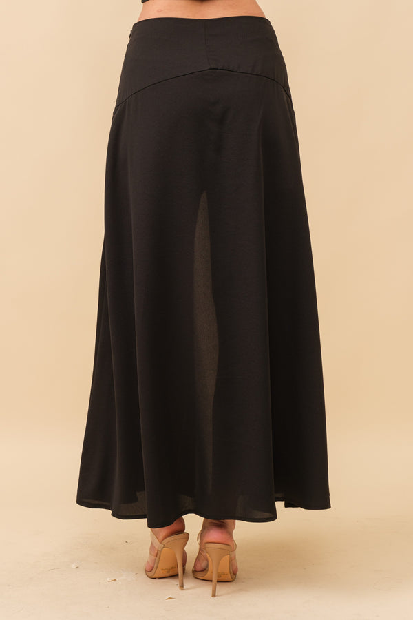 Black front slit midi skirt from women's boutique clothing, part of the summer collection boutique for stylish resort wear.