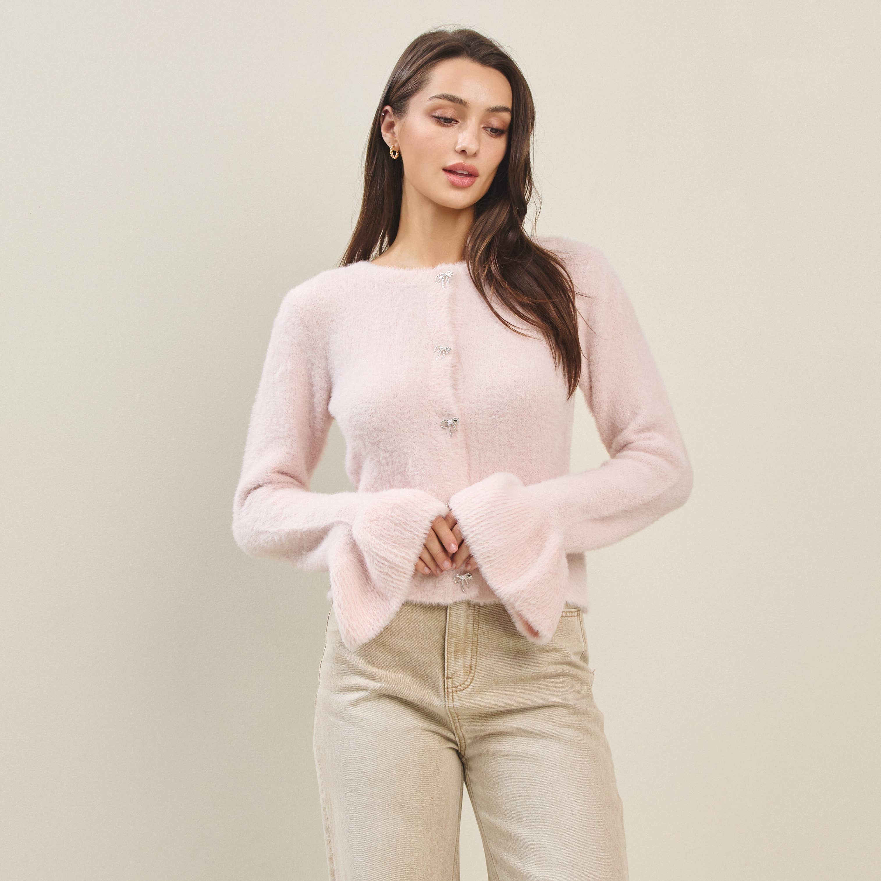 Rhinestone Bow Button Fuzzy Cardigan for women, a chic addition to summer collection boutique, perfect for resort wear.