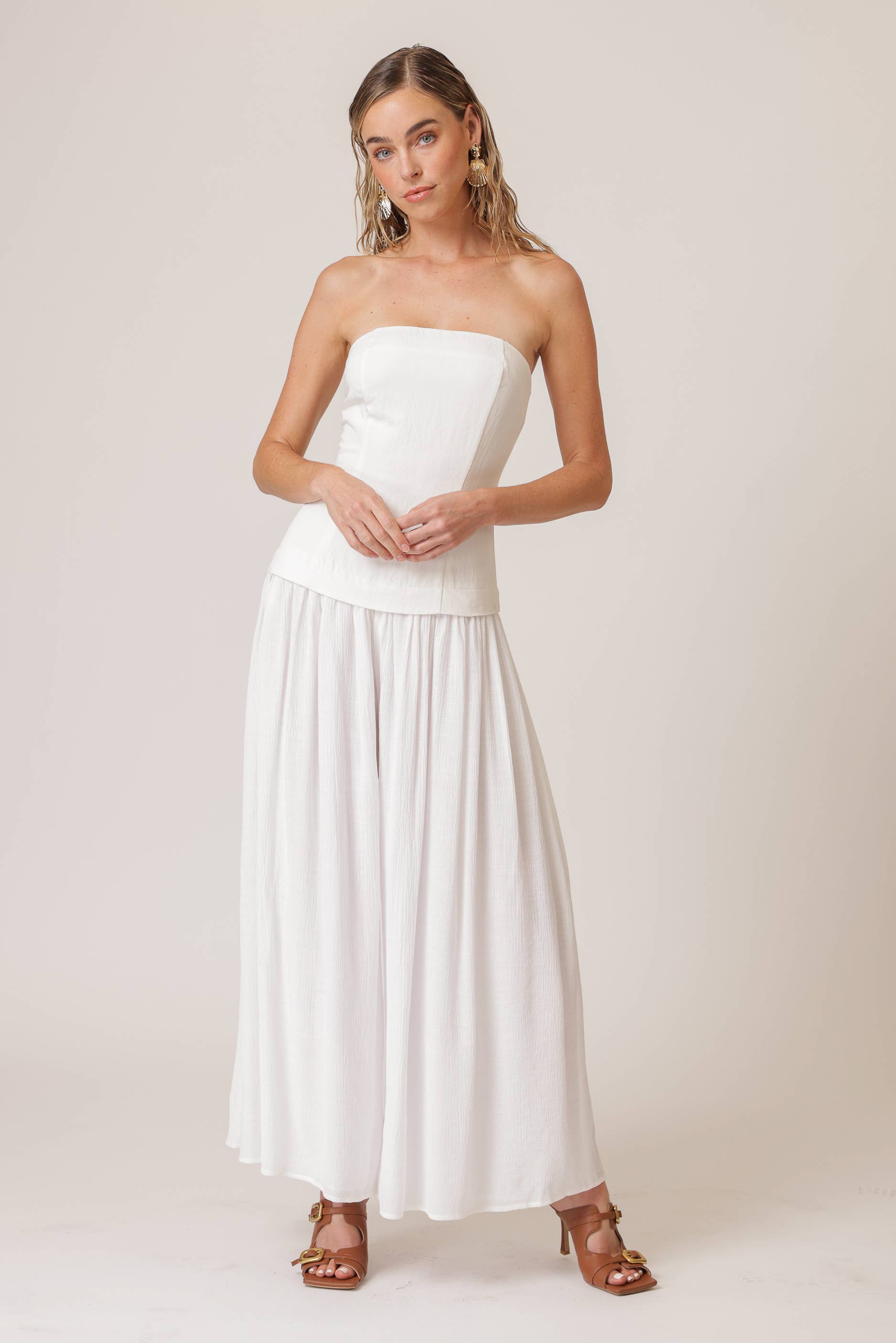 Chic women’s white strapless jumpsuit, perfect for resort wear, beach outings, and summer collection boutique styles.