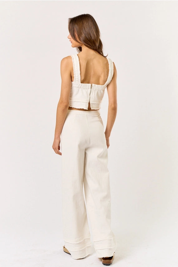 Women's boutique clothing: Off White Crop Top & Fringe Pants set, perfect for summer resort wear. Shop exclusive new arrivals.