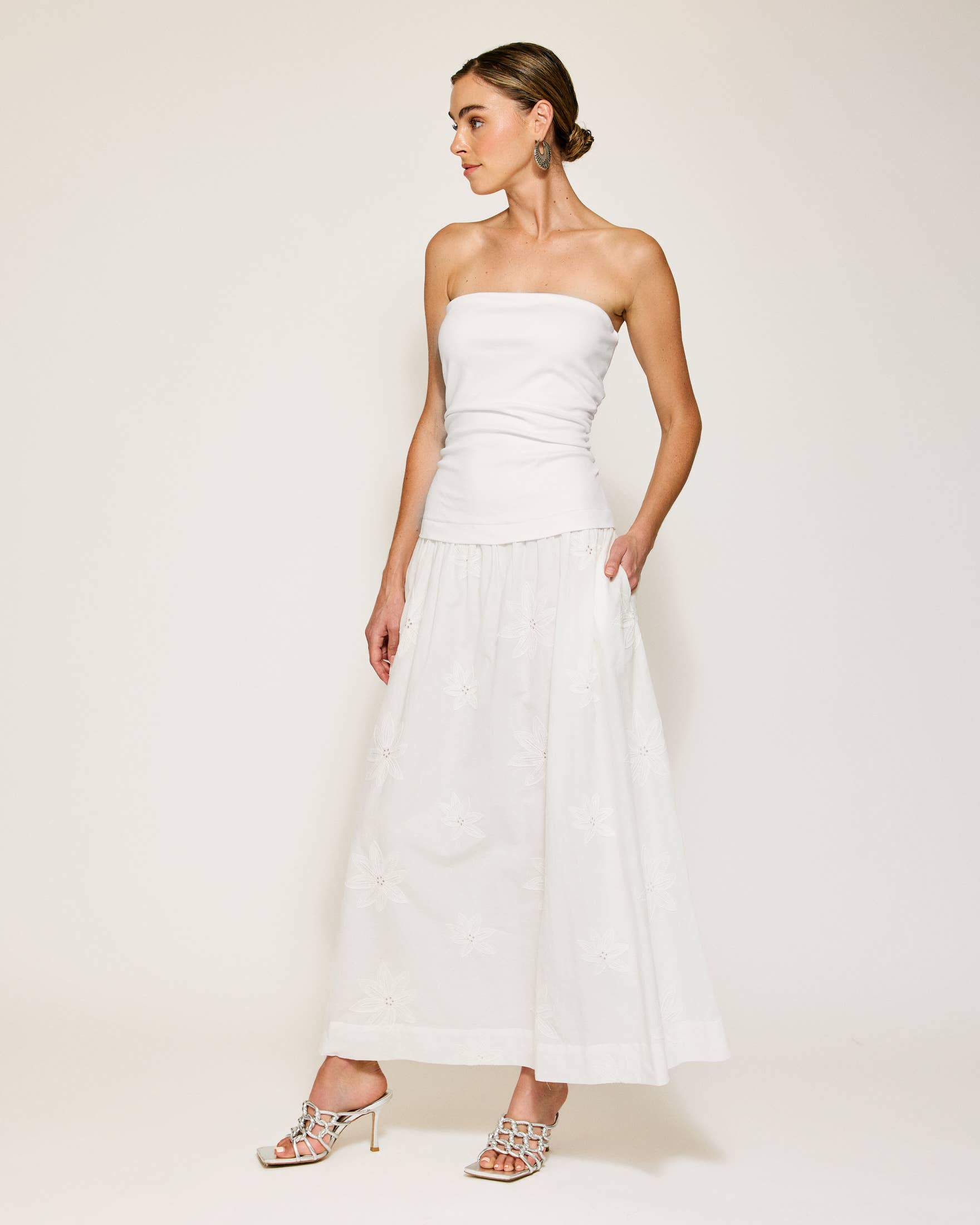 Emberly Mix-Media Strapless White Dress from a women's boutique, perfect resort wear maxi dress for summer collection.