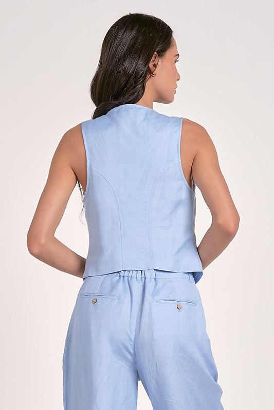 Back view of women's light blue sleeveless vest, perfect for summer collection boutique and new arrivals boutique.