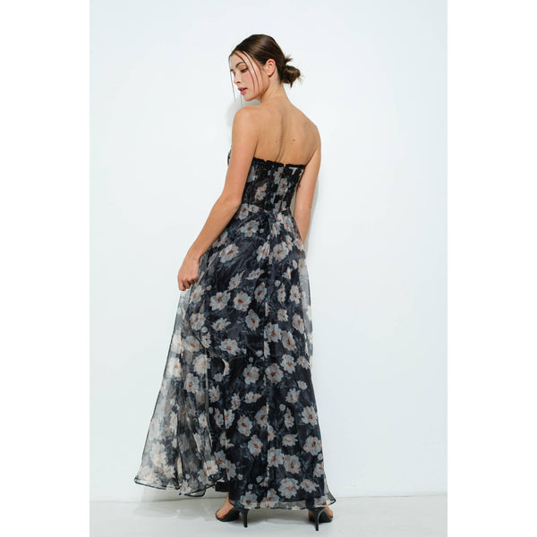 Elegant strapless taupe and black floral maxi dress with corset bodice, perfect for women's boutique clothing and resort wear.