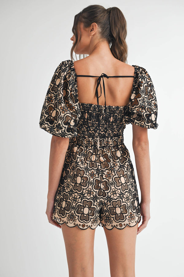 Women's boutique clothing, crochet short sleeve romper with smocked back, perfect for resort wear and summer collection.