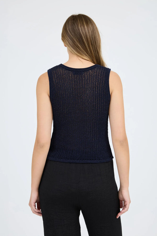 Back view of women's crochet knit vest, perfect for summer collection boutique, stylish layering for resort wear.