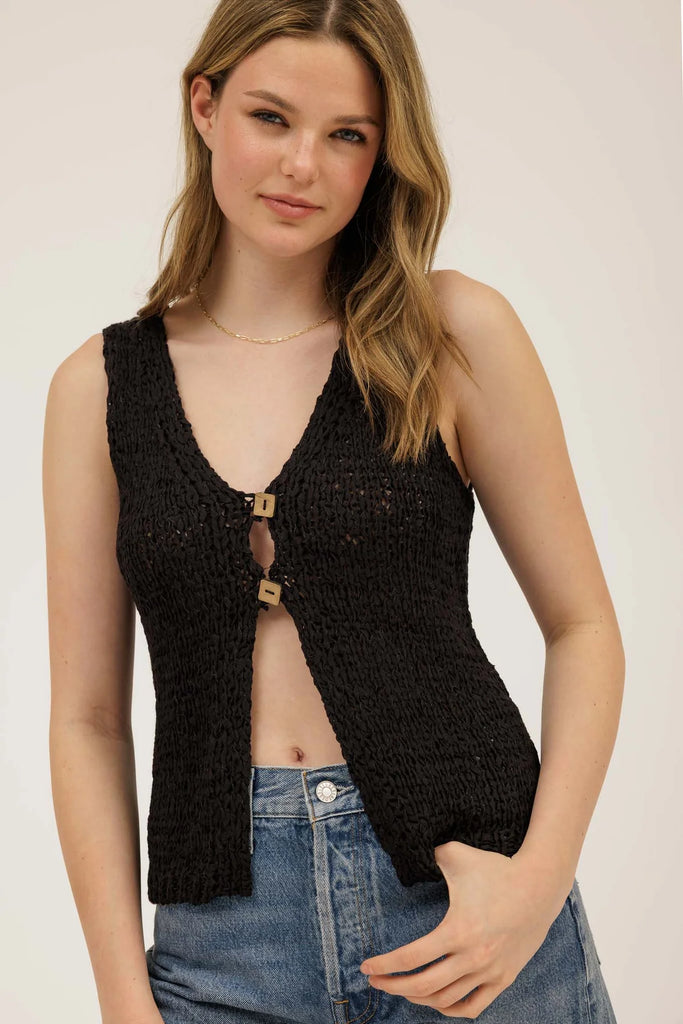 Sleek women's sleeveless cardigan vest with square button detail, perfect for boutique layering this summer.