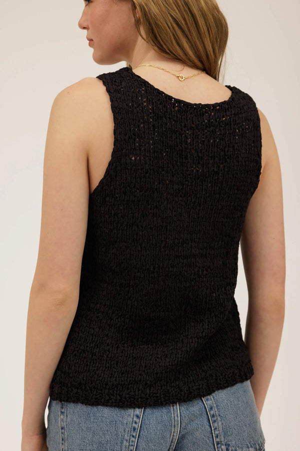 Sleeveless black cardigan vest with a stylish back design, perfect for summer collection and layering. Women's boutique clothing.