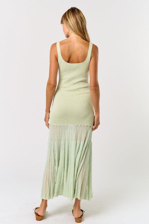 Back view of a sleeveless mint green maxi dress with sheer mesh skirt, perfect for summer collection boutique and resort wear.