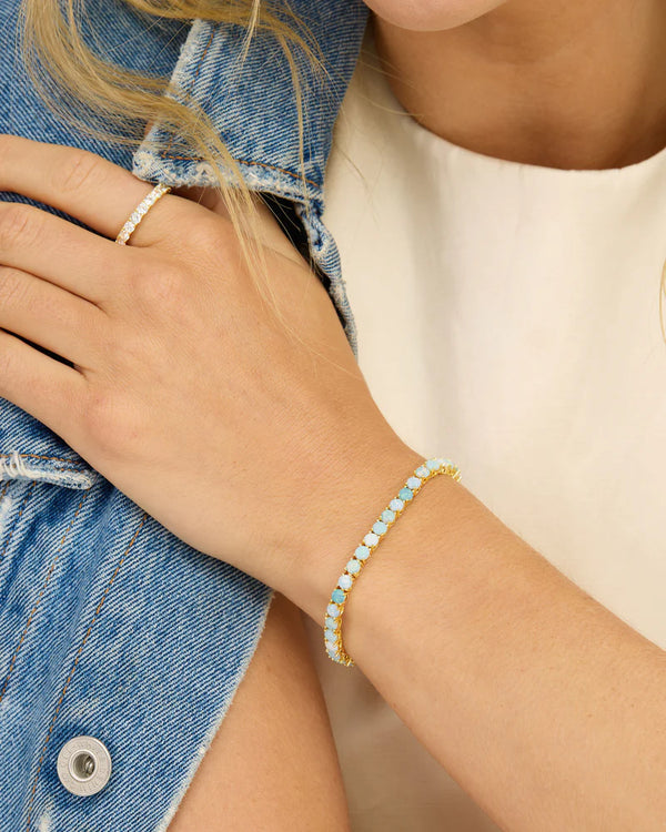 Elegant Grand Heiress Ombre Tennis Bracelet featuring blue opal stones, perfect for women's boutique jewelry and summer collection fashion.