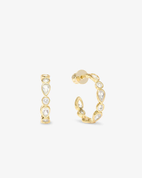 Shop Isla Hoops 0.75" simulated diamond earrings at our women's boutique; perfect for resort wear and summer collection styles.