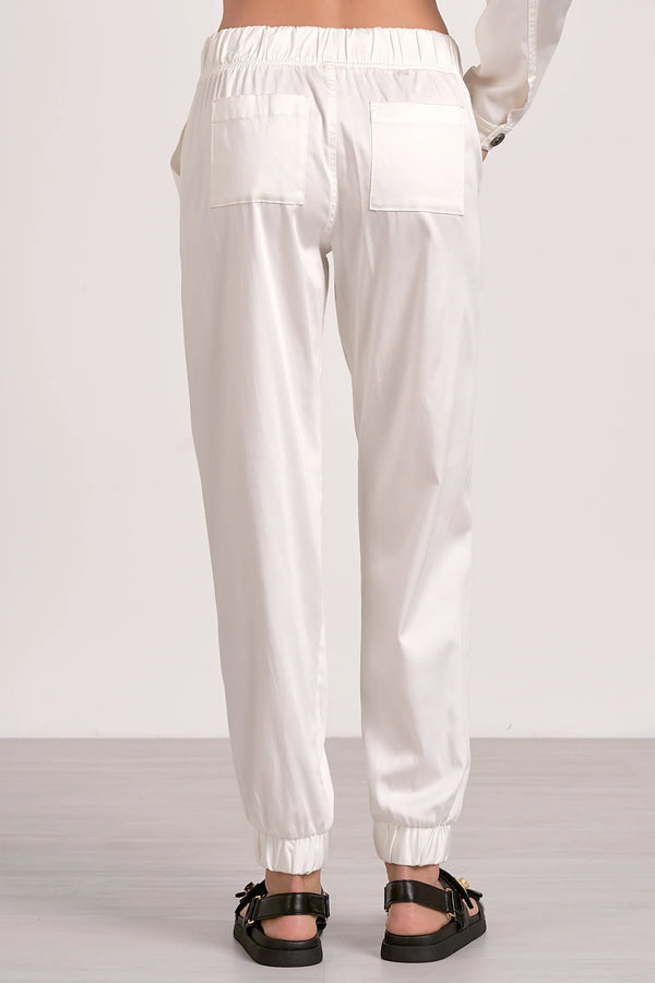 Iris White Pants with elastic waist and pockets, perfect for summer collection boutique and relaxed style in women's fashion.
