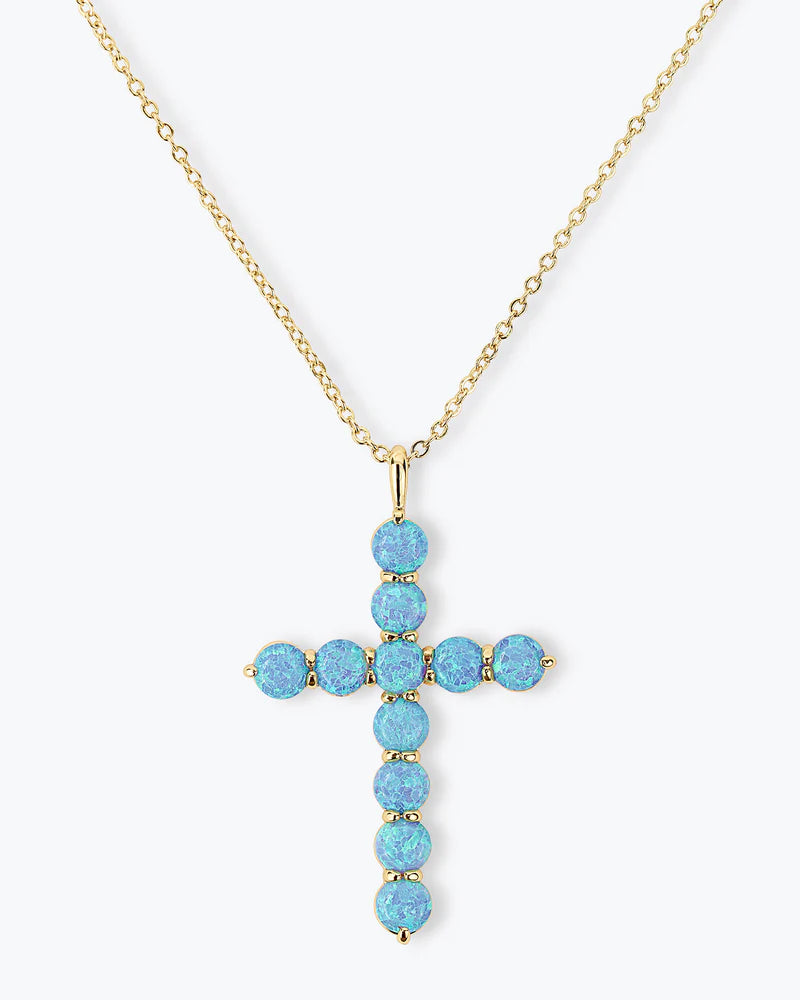 Oh She Fancy Blue Opal Cross Pendant, 18k gold plated, stunning jewelry piece for women's boutique summer collection.