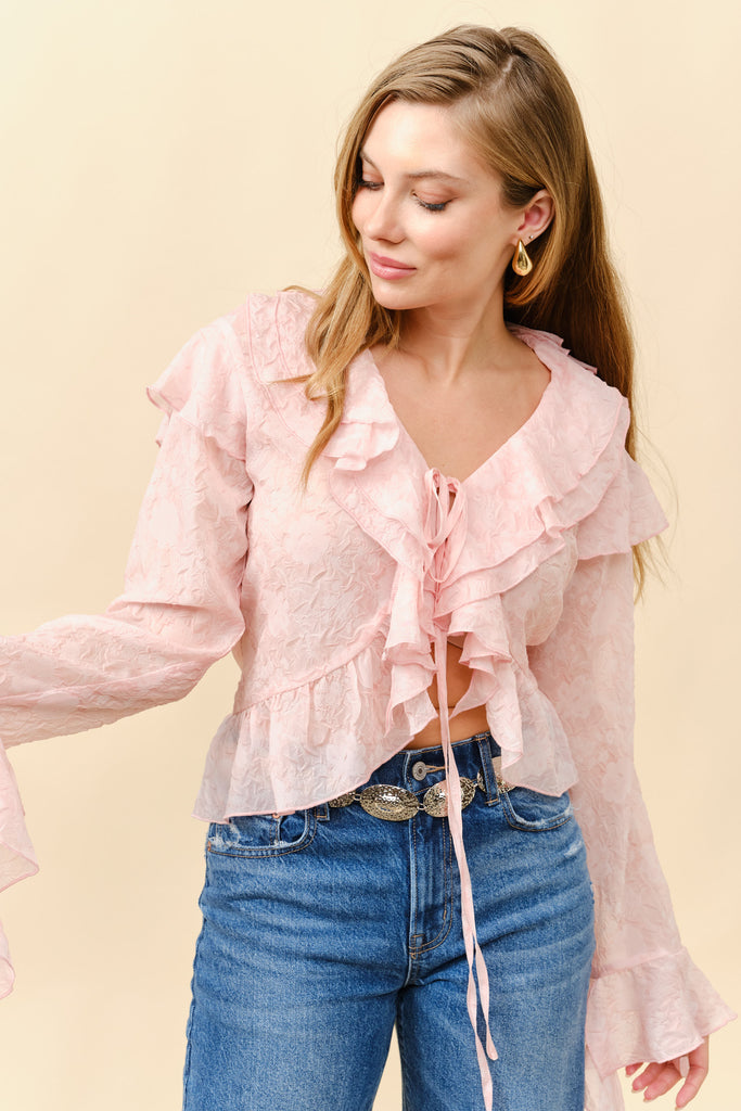Floral crinkle ruffle tie front top for women's boutique clothing. Perfect for summer collection and stylish outfits.