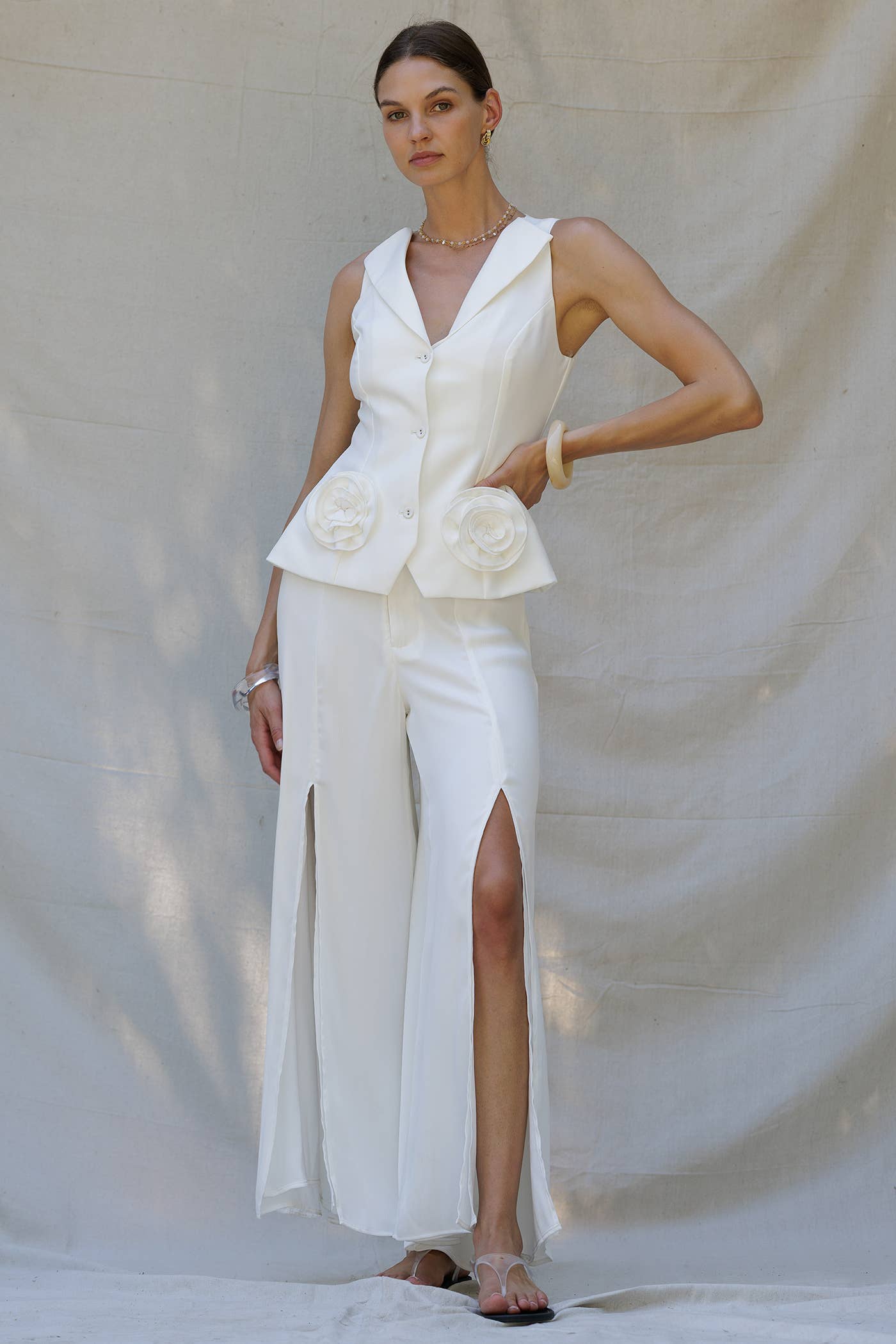 Elegant Rosette Peplum White Two-Piece Set, perfect for summer occasions. Women's boutique clothing, exclusive fashion.