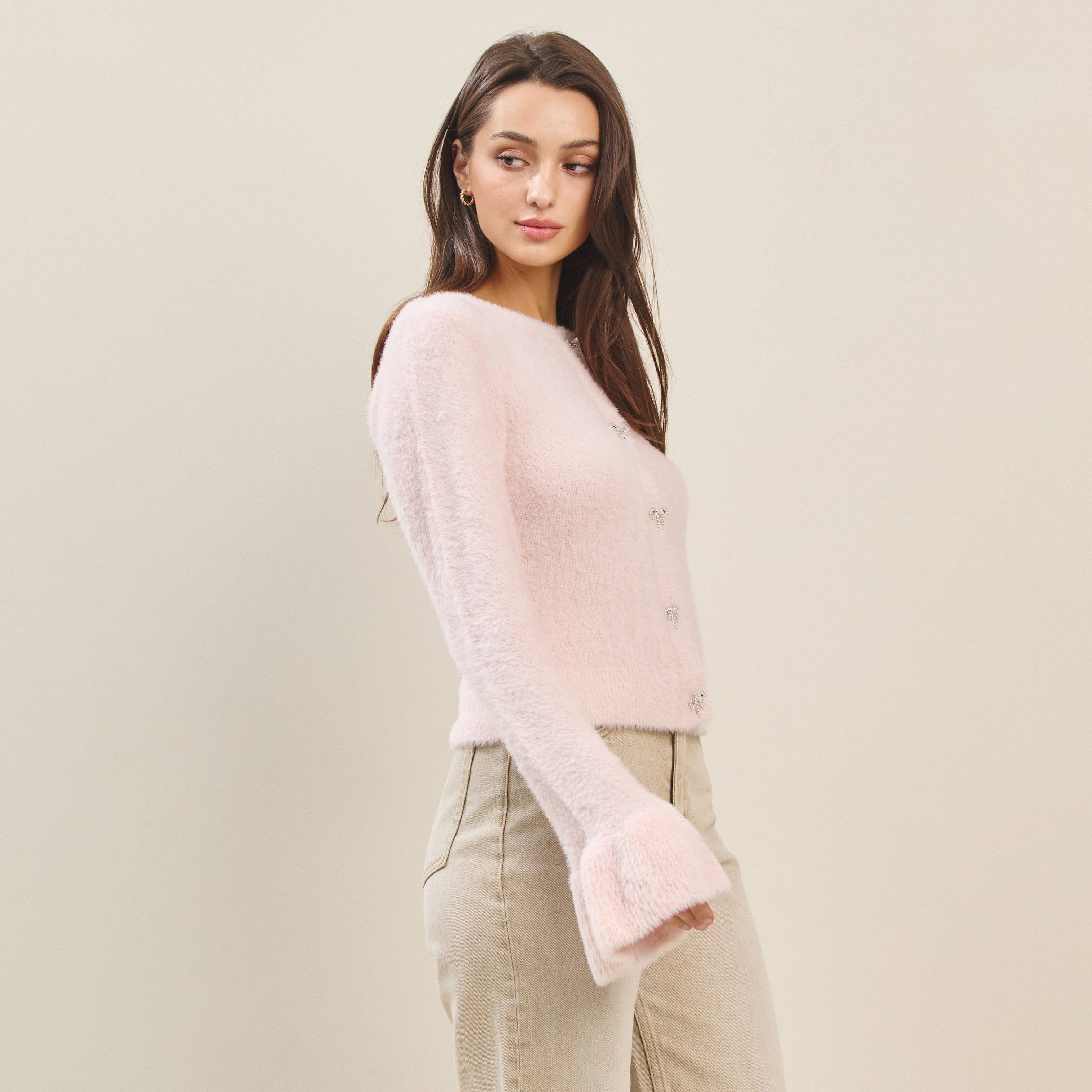 Fuzzy pink cardigan with button details, perfect for summer collection boutique and women's boutique clothing.