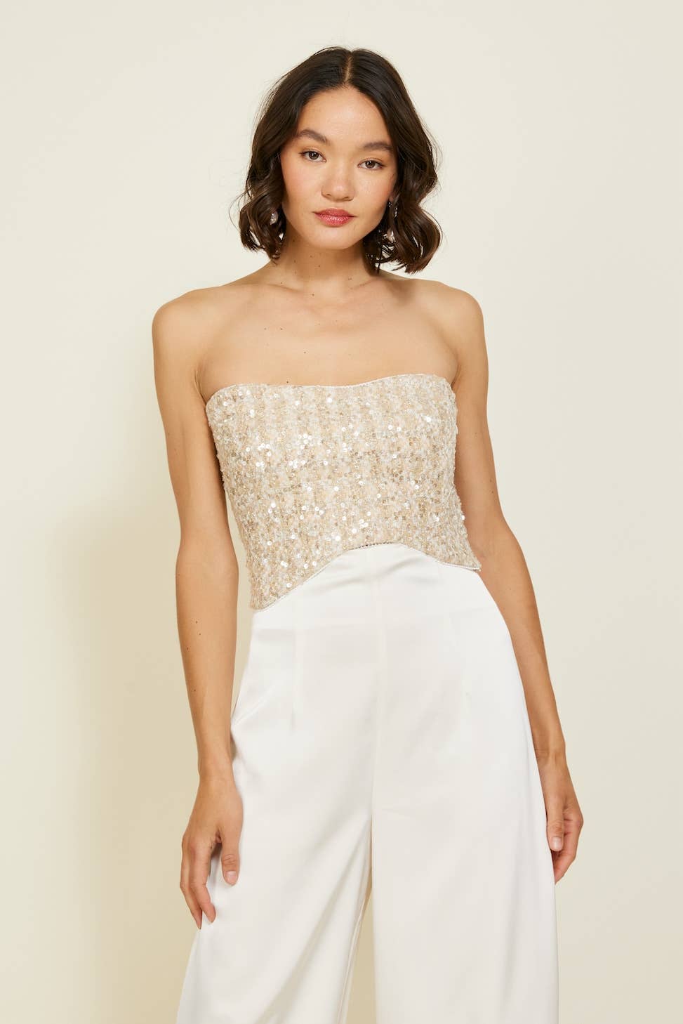 Strapless pearl top from the women's boutique clothing collection, ideal for resort wear and summer events.