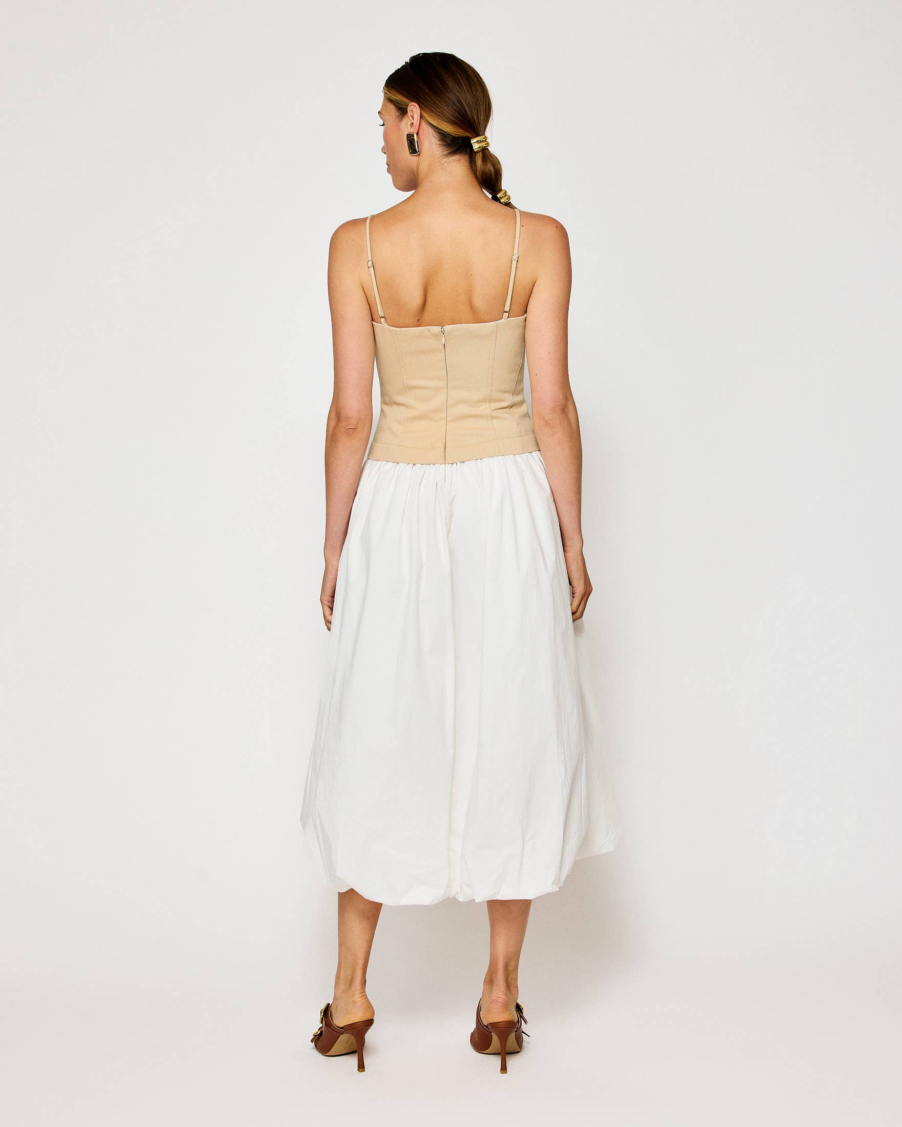 Back view of Anitha Dress in beige and white, perfect for women's boutique clothing and resort wear dresses, ideal for summer.