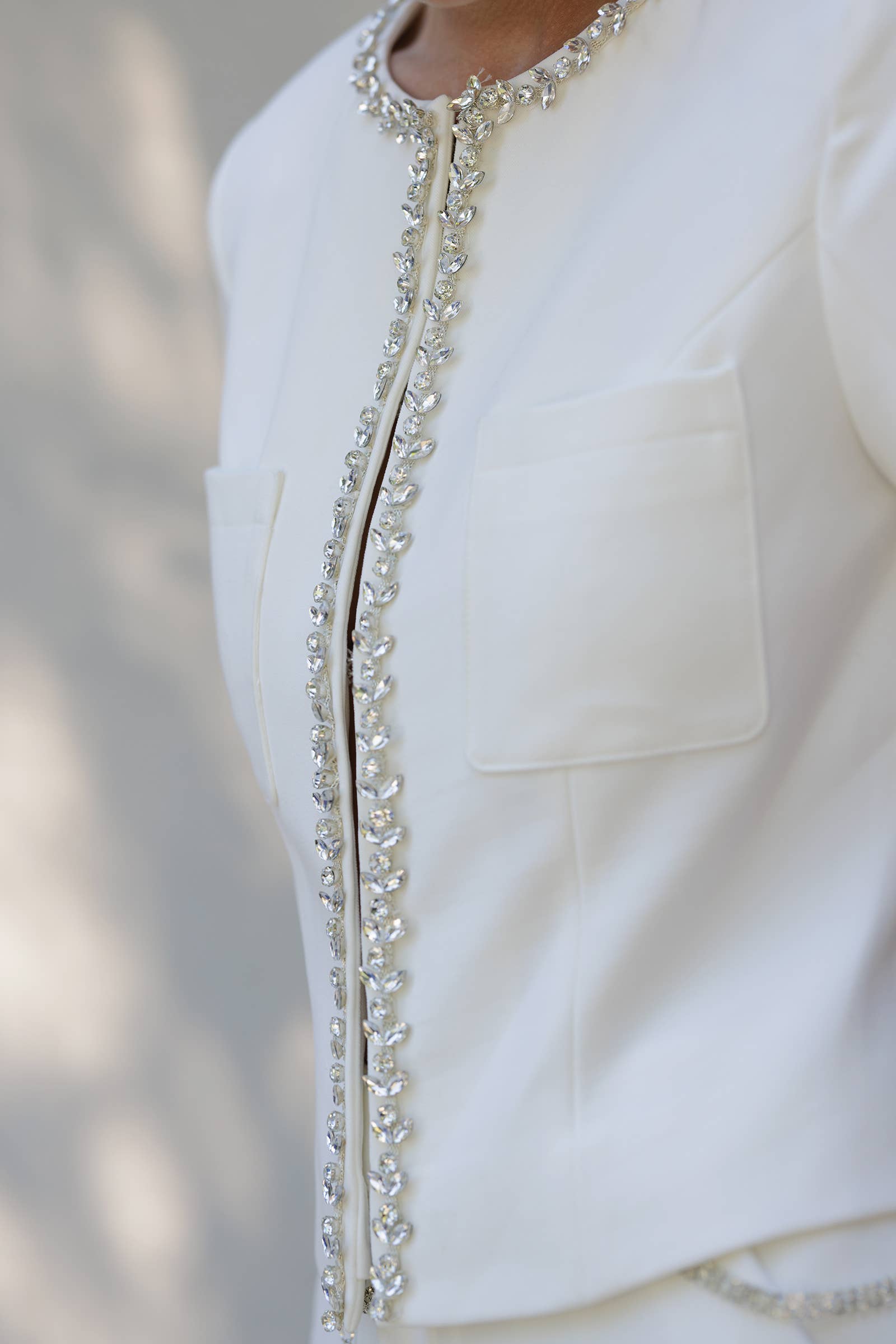 White tailored embellished short set for women, featuring a structured fit and elegant detailing, perfect for summer boutique fashion.