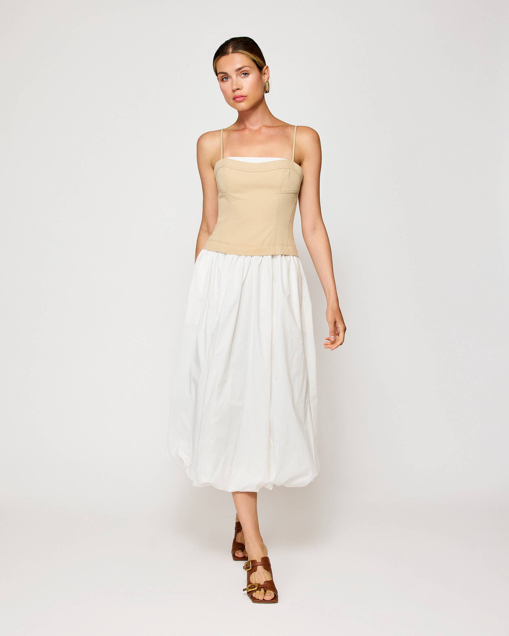 Anitha Dress Beige and White: Elegant two-tone midi dress perfect for resort wear, showcasing women's boutique clothing and summer collection.