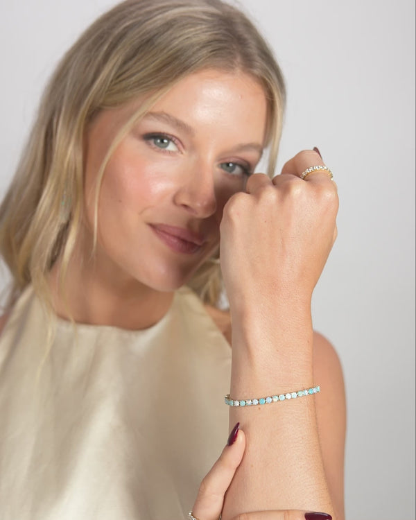 Model showcasing the Grand Heiress Ombre Tennis Bracelet, perfect for women's boutique jewelry collection and summer fashion.